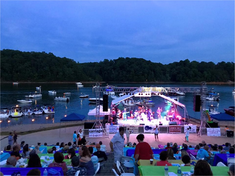 Wide waterfront view of a Jarrard Burch Foundation concert